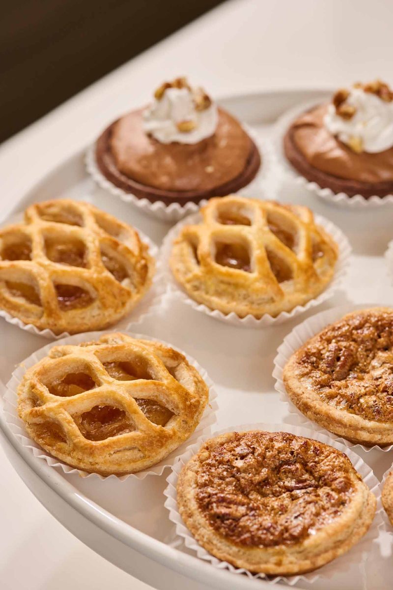 Assorted mini pies with lattice and crumble tops